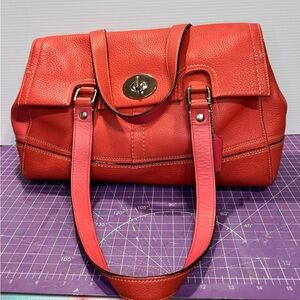 Coach Hampton in coral pebbled leather